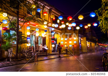 Hoi An, Vietnam - Crowd of people in the evening on the street in Hoi An, Vietnam 60546948