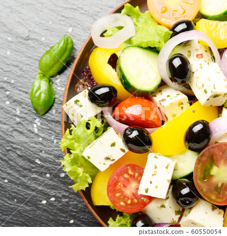 Top view at Mediterranean diet dish greek salad on 60550054