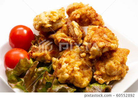 Deep-fried chicken (with sunny lettuce and cherry tomatoes). Deep-fried chicken (with sunny lettuce and cherry tomatoes). 60552892