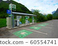 Public electric vehicle charging station. The cost of charging is set by the charging service provider 60554741