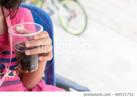 close up drinking cola from glass 60555752