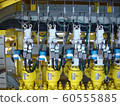 Hydraulic choke or throttle valves ninety degree angle valve type at oil and gas wellhead 60555885