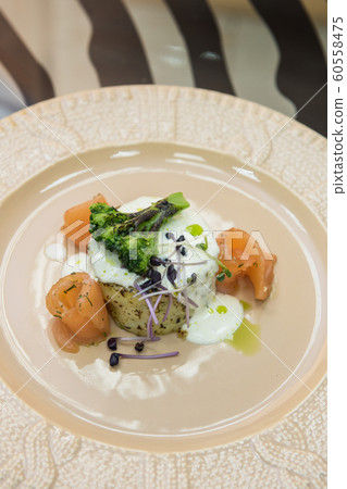 Potato casserole with broccoli and salmon 60558475