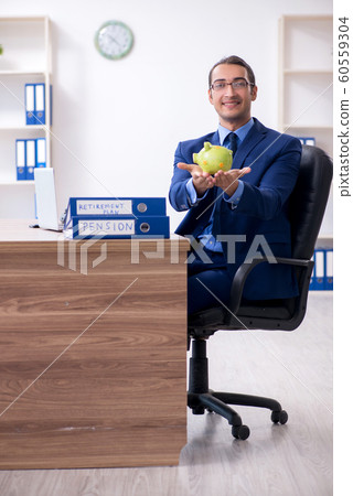 Young male accountant working in the office Young male accountant working in the office 60559304
