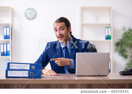 Young male accountant working in the office 60559341