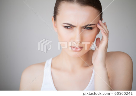 Health and Head Pain. Beautiful Woman Having Strong Headache, Feeling Pain 60560241