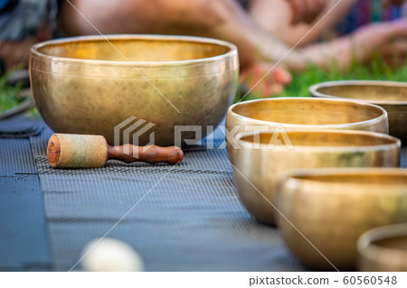 Brass set of singing bowls for yoga and meditation 60560548