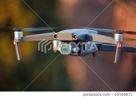 Drone flying outdoors Drone flying outdoors 60560671