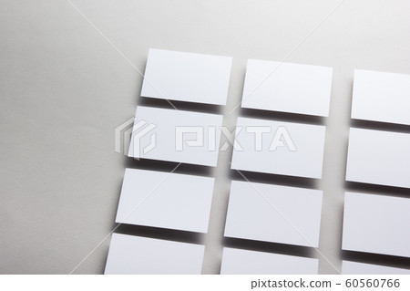 Business card blank on wooden background. Corporate Stationery, Branding Mock-up. Creative designer desk. Flat lay. Copy space for text 60560766