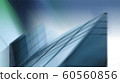 Abstract business modern city urban futuristic architecture background, motion blur, reflection in glass of high rise skyscraper facade, toned blue picture with bokeh. Real estate concept 60560856