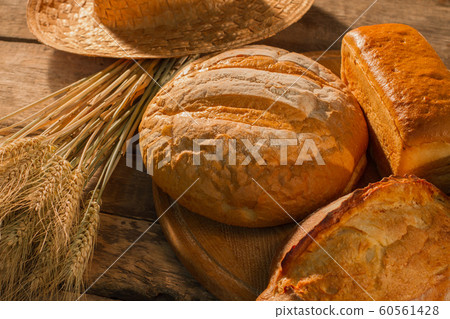 Bread and wheat ears. Bread and wheat ears. 60561428