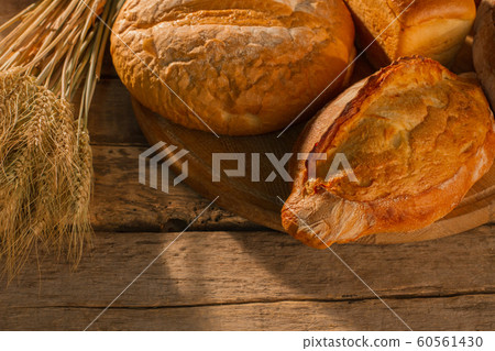 Fresh homemade bread from wheat flour. Fresh homemade bread from wheat flour. 60561430