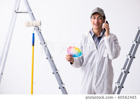 Painter working at construction site Painter working at construction site 60562485