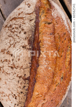 Homemade loaf of wheat bread. 60562541