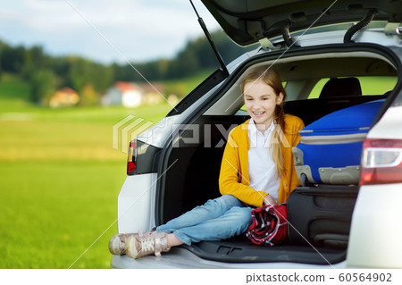 Adorable little girl ready to go on vacations with Adorable little girl ready to go on vacations with 60564902