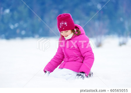 Adorable little girl having fun in beautiful 60565055