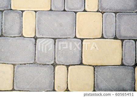 concrete yellow-blue paving slab, background 60565451