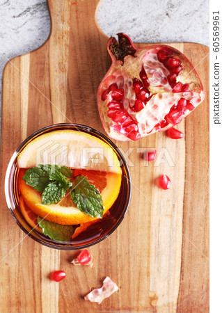 glass of pomegranate drink with fresh citrus glass of pomegranate drink with fresh citrus 60569961