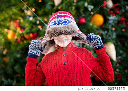 child at christmas 60571155