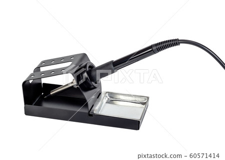 Electric soldering iron on a stand. 60571414