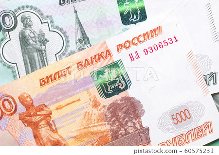 Russian ruble. Russian currency closeup in the form of texture. Russian ruble. Russian currency closeup in the form of texture. 60575231