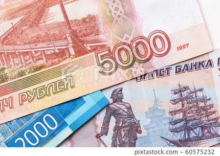 Russian ruble. Russian currency closeup in the form of texture. 60575232