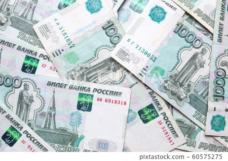 Russian ruble. Russian currency closeup in the form of texture. Russian ruble. Russian currency closeup in the form of texture. 60575275