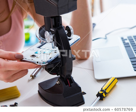 Mobile phone repair in workshop 60578769