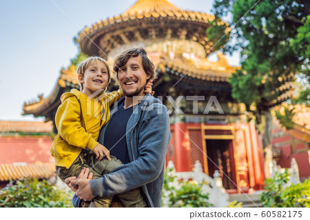 Enjoying vacation in China. Dad and son in Forbidden City. Travel to China with kids concept. Visa free transit 72 hours, 144 hours in China 60582175