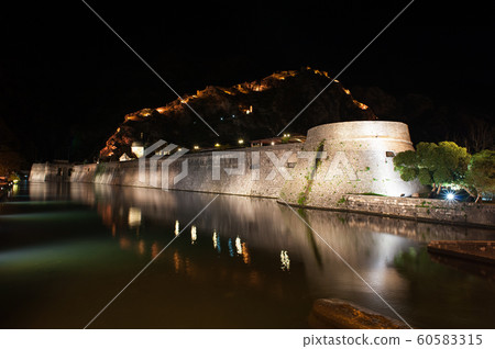 Ancient stone wall located in the city of Kotor Ancient stone wall located in the city of Kotor 60583315