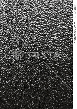 monochrome abstraction blurry drops of water on the glass. dark background for design. monochrome abstraction blurry drops of water on the glass. dark background for design. 60583808