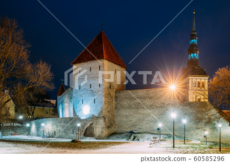 Tallinn, Estonia. Medieval Tower Neitsitorn At Winter In Evening Night Illuminations.UNESCO Famous Landmark. Destination Scenic. Tallinn, Estonia. Medieval Tower Neitsitorn At Winter In Evening Night Illuminations.UNESCO Famous Landmark. Destination Scenic. 60585296
