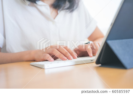 Young Freelancer or Businessman working at home 60585597