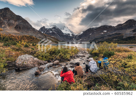 Group of photographers taking a photo with tripod 60585962
