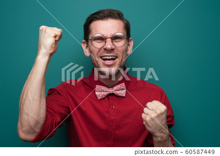Portrait of a successful happy young man Portrait of a successful happy young man 60587449