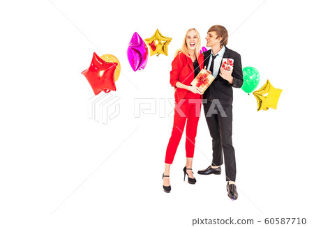 young happiness couple enjoy posing with colorful ballons in new year celebration party 60587710