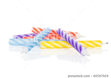 Birthday cake candle isolated on white Birthday cake candle isolated on white 60587929