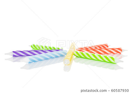 Birthday cake candle isolated on white Birthday cake candle isolated on white 60587930