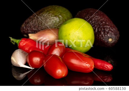 Guacamole ingredient isolated on black glass 60588130