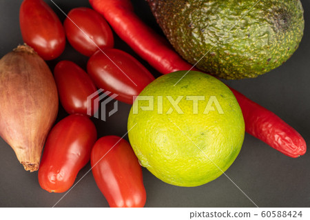 Guacamole ingredient on grey ceramic Guacamole ingredient on grey ceramic 60588424