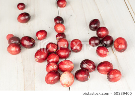 Fresh red cranberry on grey wood Fresh red cranberry on grey wood 60589400