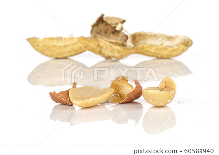 Tasty beige peanut isolated on white 60589940