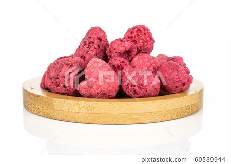 Dried red raspberry isolated on white 60589944