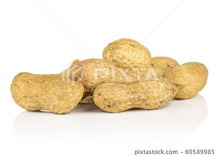 Tasty beige peanut isolated on white 60589985