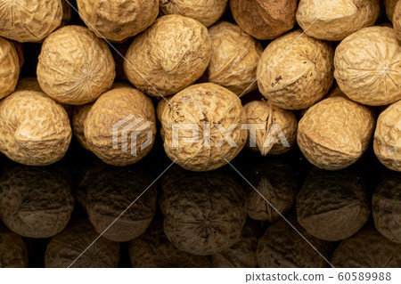 Tasty beige peanut isolated on black glass 60589988