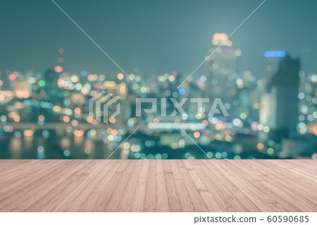 Wood floor terrace or wooden table with blur background rooftop perspective view city night light bokeh 60590685