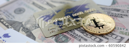 Gold coin bitcoin closeup lie on table 60590842