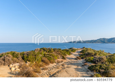 Sandy road to the sea in Greece Sandy road to the sea in Greece 60594779