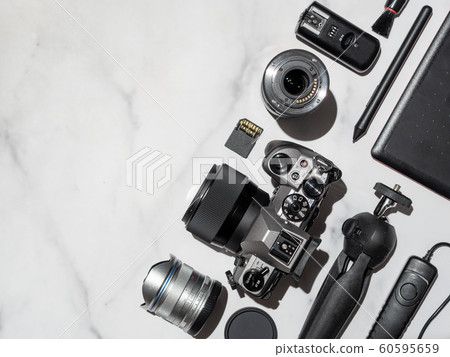 Camera and accessories on table, copy space 60595659