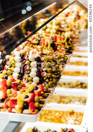 A wide variety of traditional tapas with seafood in Spain at the San Miguel market 60596244